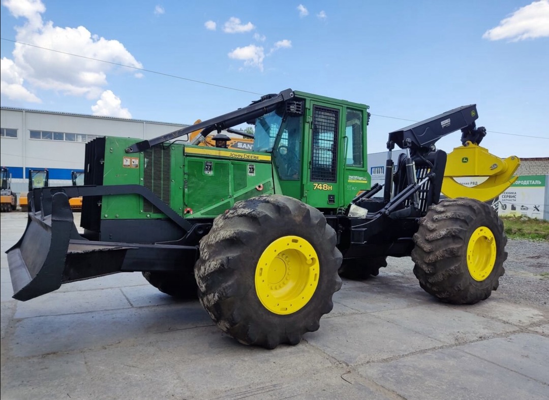 JOHN DEERE скиддер колесный 748H_0